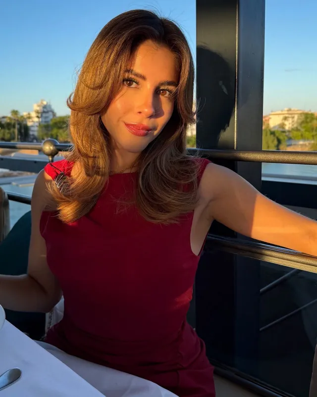 Flavia at sunset in a red dress